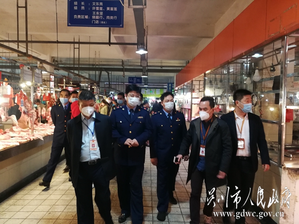 图二、1月26日，吴康保副局长、黄学辉副局长带队检查农贸市场，督导做好防控工作.jpg